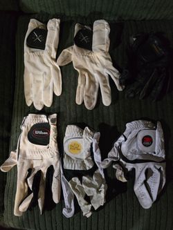 Used men's left hand golf gloves