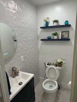 Bathroom Tile With Toilet And Beautiful Vanity 