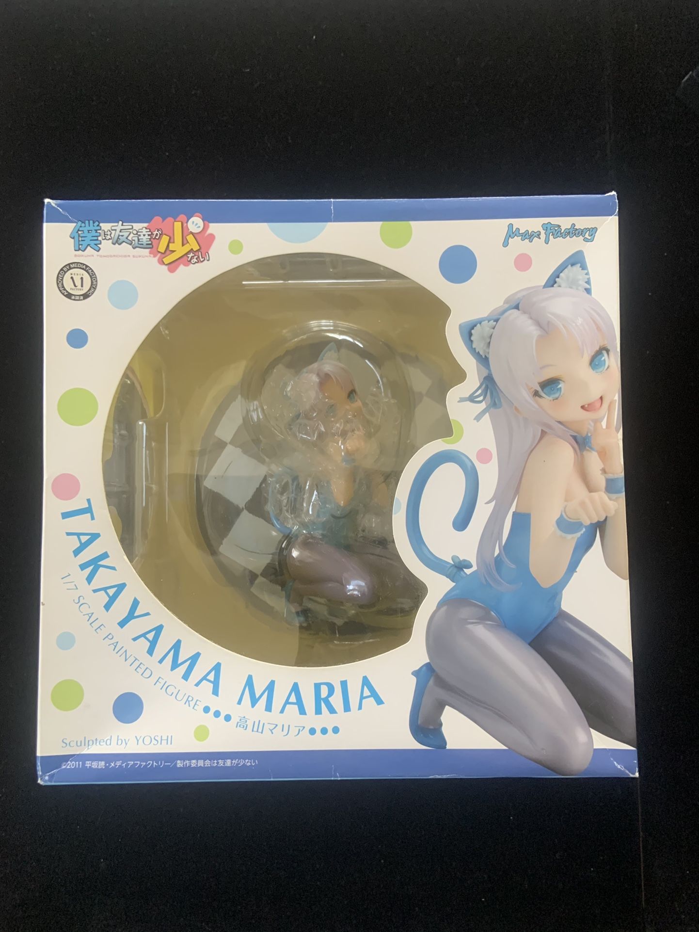 Maria in a charming pose with a teddy bear