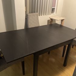 Black Dining Table with Extendable Leaves