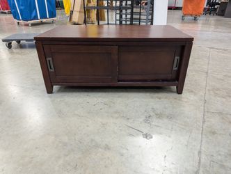 Contemporary Dark Wood Media Console with Sliding Doors