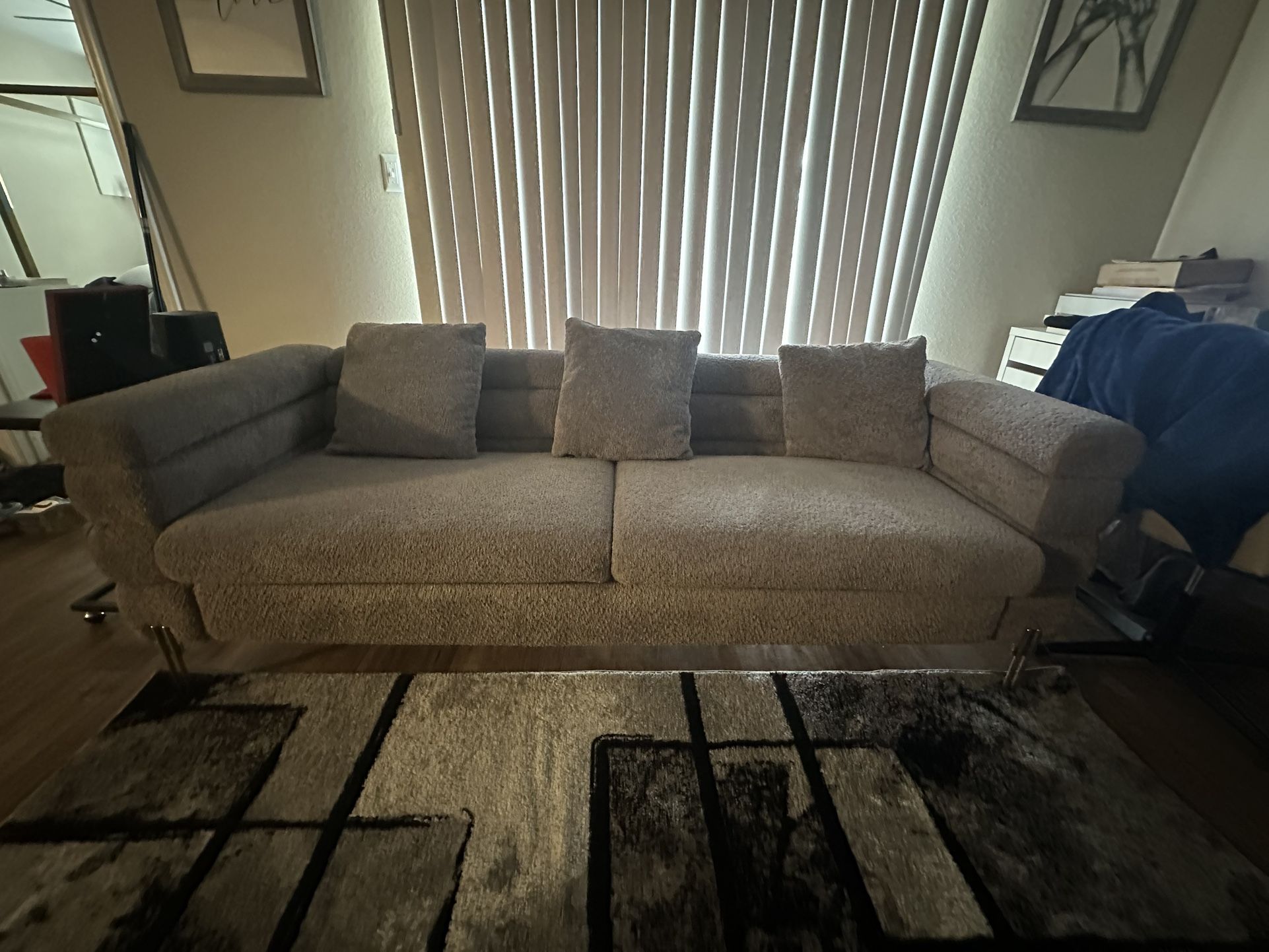 Grey Couch With Gold Accents