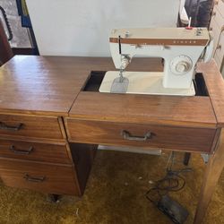 Sewing Machine In A Wooden Cabinet 