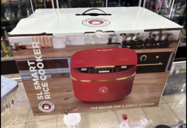 Smart Chef's Counter 5L rice cooker. Still in box and plastic wrap. Has automatic temperature and moisture sensing, easy guided cooking modes, delay s