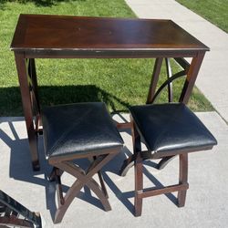 High Top Bar Table And Two Bar Stools 