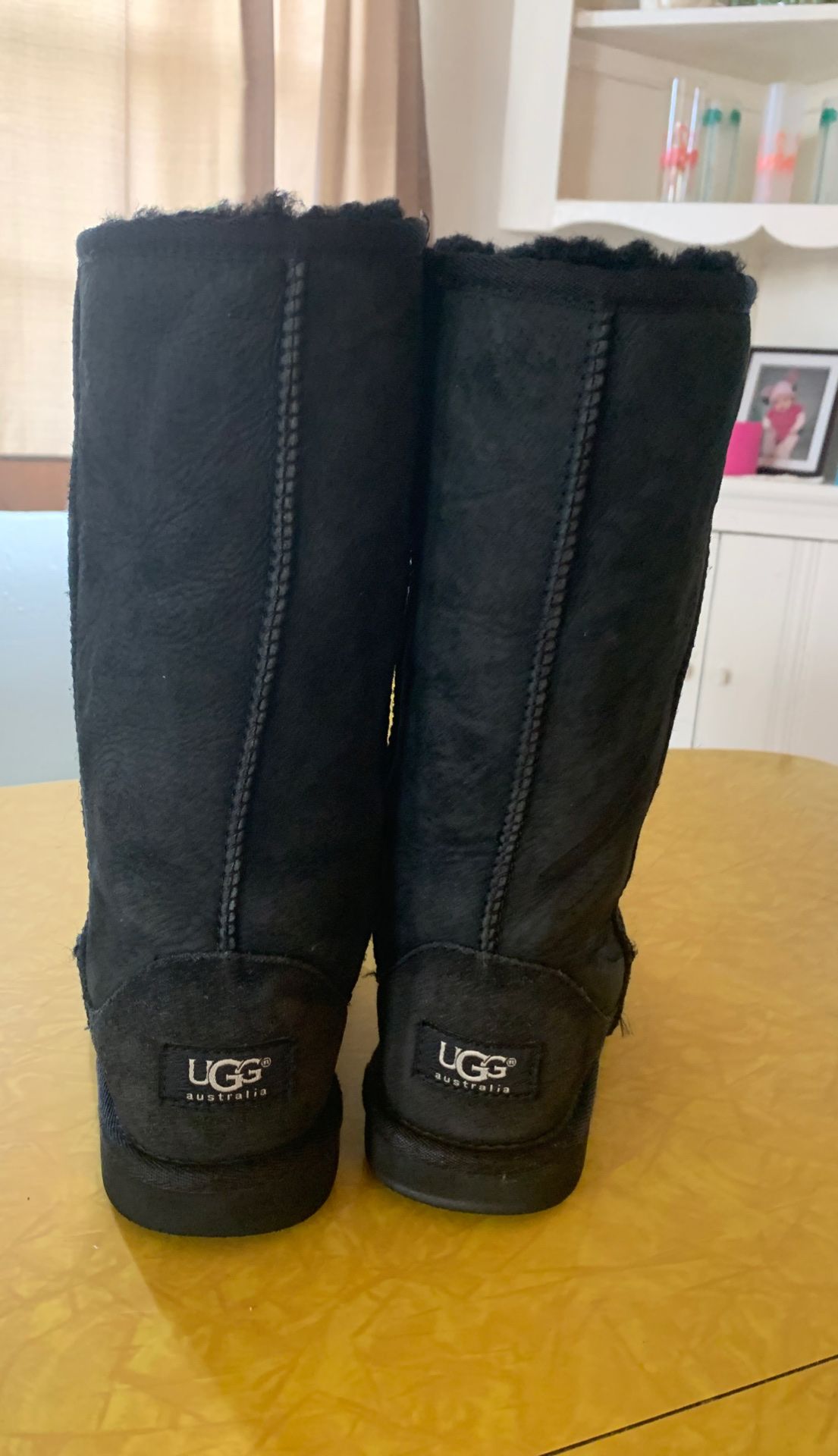 Women size 4, Youth size 2 tall black Ugg Boots