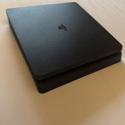 PS4 Slim. Does Not Include Games Or Controllers