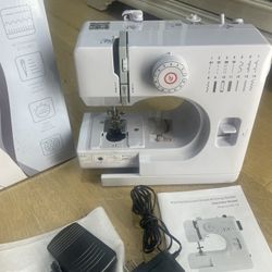Brand New Sewing Machine In Bags