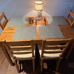 Solid Wood IKEA Dining Table + 4 Chairs w/ Cushions – Excellent Condition