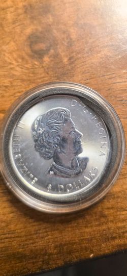 Canadian Silver Coin in Capsule 1/14 ounce.