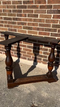 Antique wheeling table base