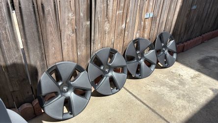 Tesla hubcaps new takeoffs no scratches or road rash