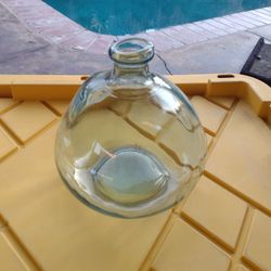 Glass Jar That You Could Use For Flowers Are Put Lights In