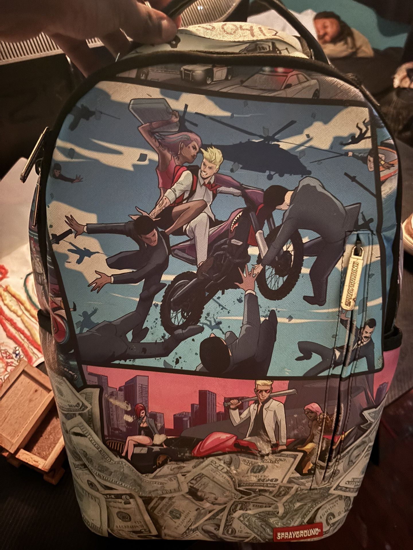 sprayground book bag 
