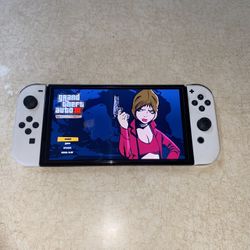 NINTENDO SWITCH OLED with 100 SWITCH GAMES and 7000 CLASSIC GAMES