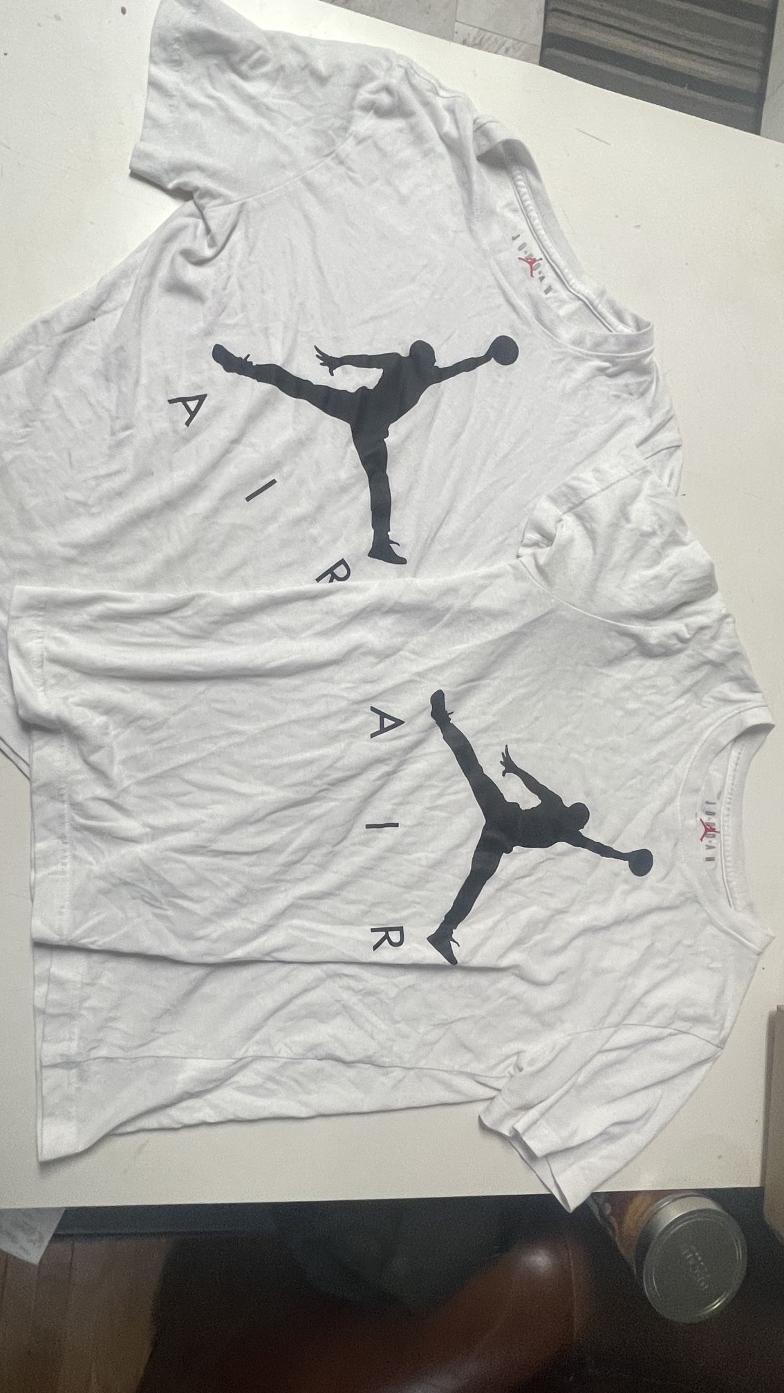 3 Jordan Tshirts 1 Nike Tshirt And 1 Quikslilver Tshirt And 1 Nike Shorts