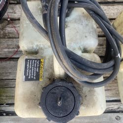 Two outboard motors oil tank