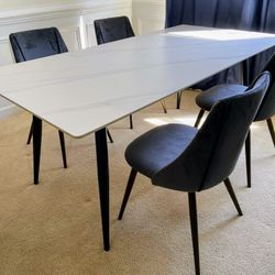 New-In Box: Dinning  Table 70.9" L x 35.4" Antique White Sintered Stone With metal legs.