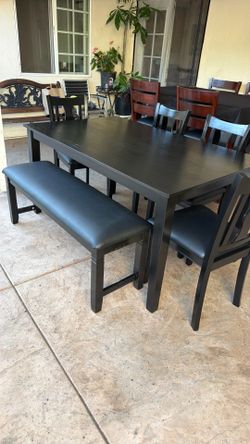 Black Dining table and 4 chairs one bench like New