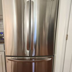 LG stainless steel 2 door refrigerator with a pullout freezer in excellent working condition