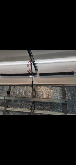 Garage Door Broken Spring Opener Off Track Adjustment Replace And Parts