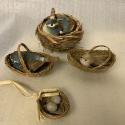 vintage, anthropomorphic bluebird figurines in woven baskets Bird Nests Eggs 
