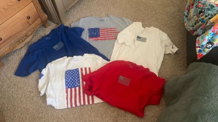5 T-shirts that have flags on them