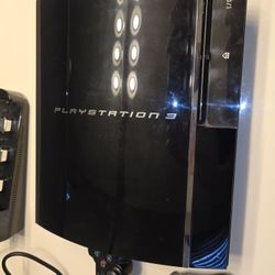 Original Sony PS3 with backwards compatibility with ps1 and ps2 games
