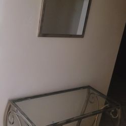 Metal console table with a mirror setI sprayed painted it with beautiful bronze color)