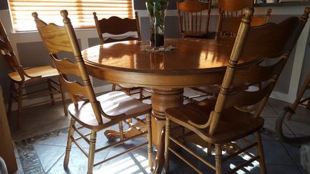 Solid oak dinner table and chairs