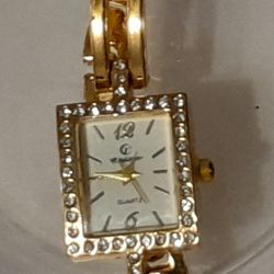 Golden wrist watch
