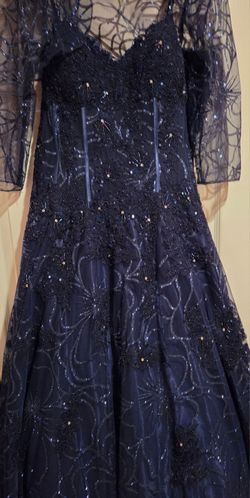 JOVANI Elegant navy blue formal gNavy Blue Lace and Sequin Formal Gownown