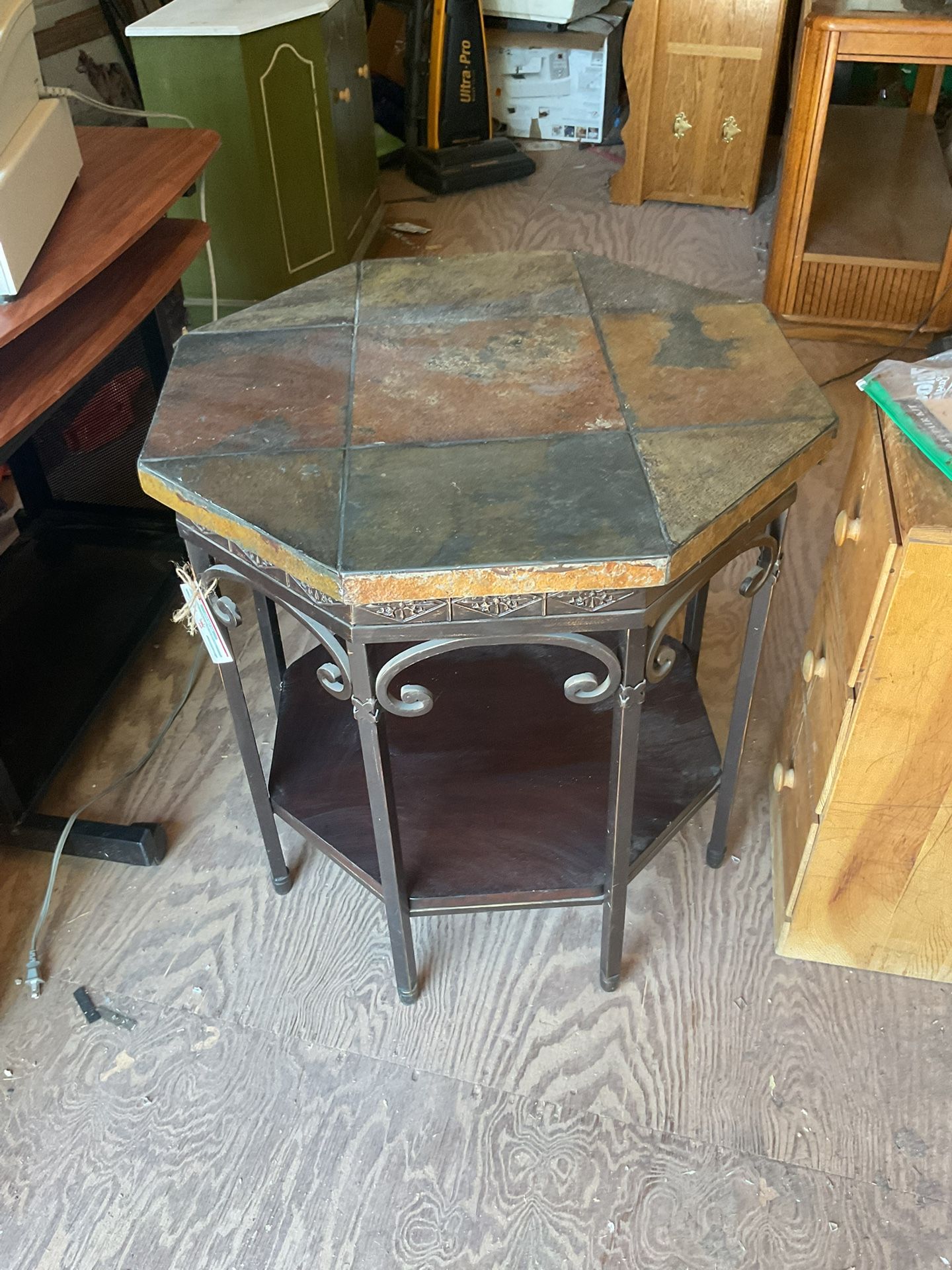 Beautiful Slate table it’s 27 inches tall and 26 by 26 inches
