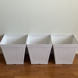 3 white plastic pots for plants