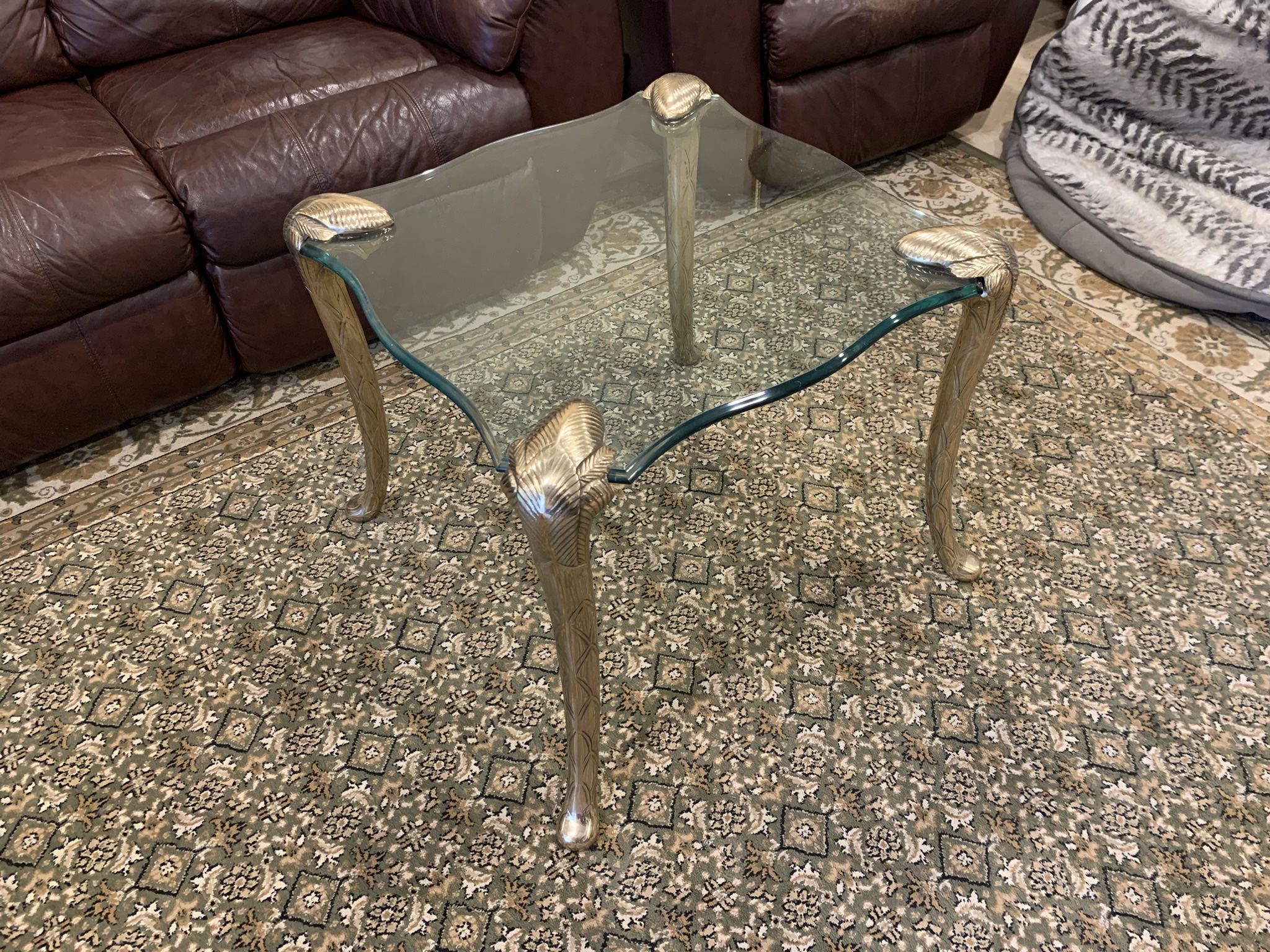 Table in the style of P.E Guerin. Glass top and beautiful brass legs.