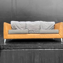 Reimagined MCM Leather And Fabric Cushioned Couch