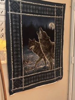 wildlife quilt fabric panel titled "Howling Wolves"