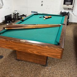 Pool Table With Set Of Balls, Extra Truck And A Good Amount Of Sticks