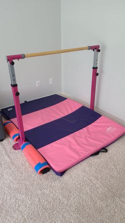 Kids gymnastics bar and mat