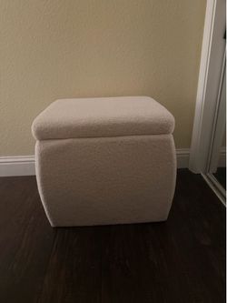 White storage cube fits a lot and is very deep