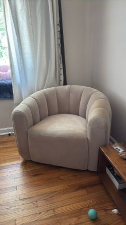 CB2 Swivel arm chair