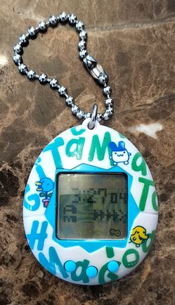 2017 Tamagotchi 20th Anniversary Celebration Edition handheld digital pet