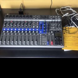 Zoom livetrak 12 12-channel digital mixer and recorder.