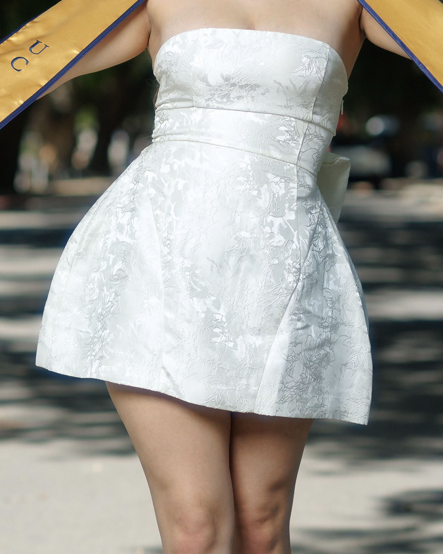 White mini dress with bow
