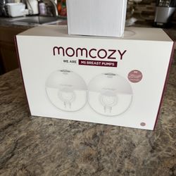 Brand New Mommy Cozy 5M Breast Pump Comes With Extra Parts That It Is Worth $25 Plus Tax Altogether Asking $180 