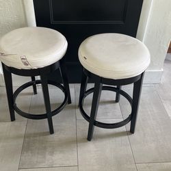 2 Counter Height Swivel Stools 