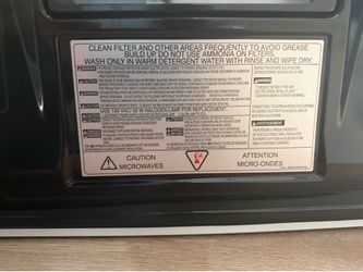Brand New GE Range Hood Microwave (Broken Front Glass)