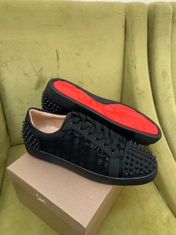 Christian Louboutin with design