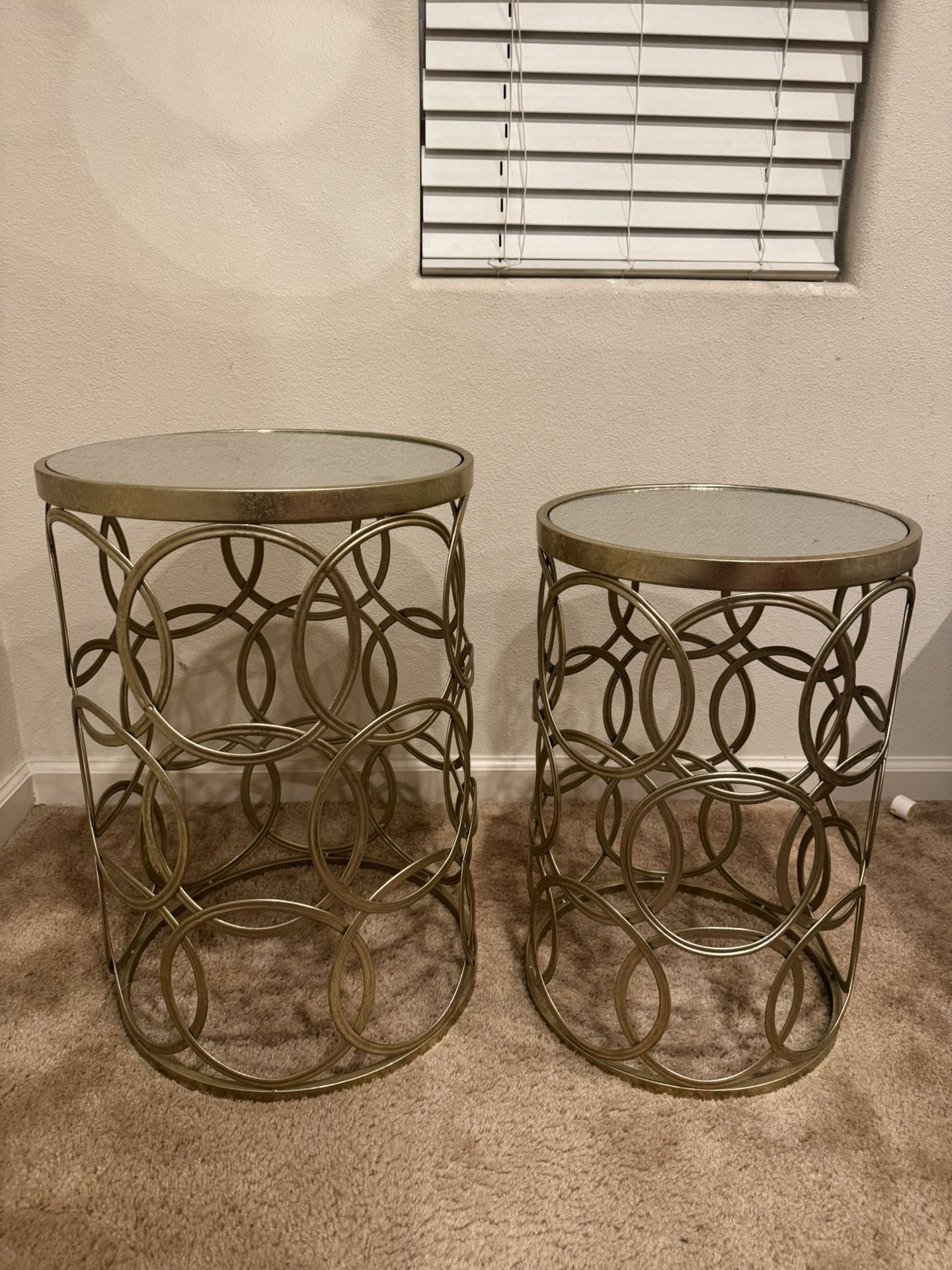 Glass top metal side table in good condition.