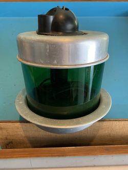 Vintage green glass vaporizer